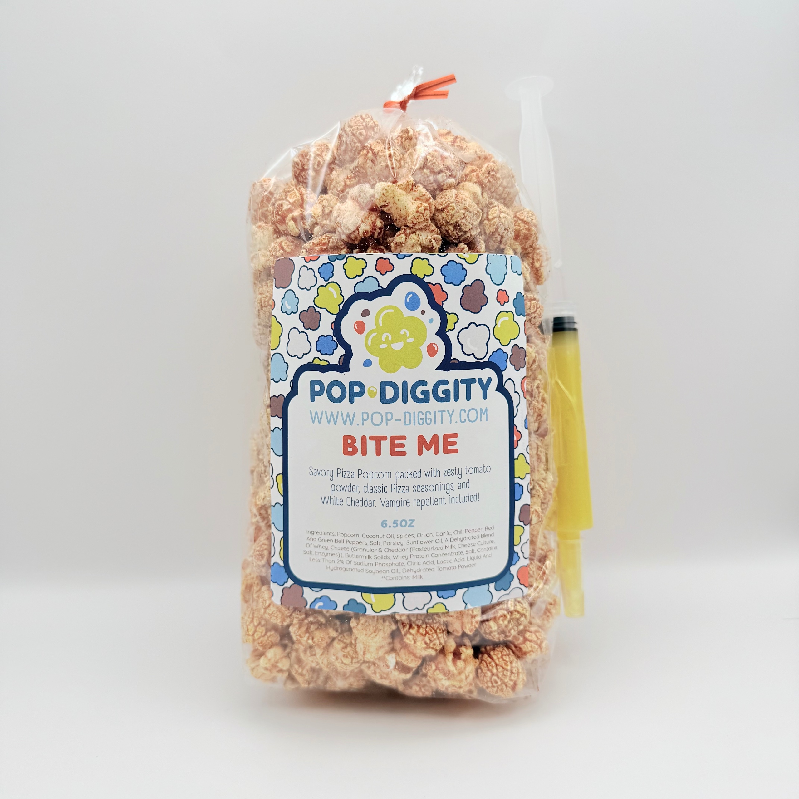 A bag of Pop Diggity Bite Me popcorn, savory pizza popcorn with white cheddar, in Galveston, Texas